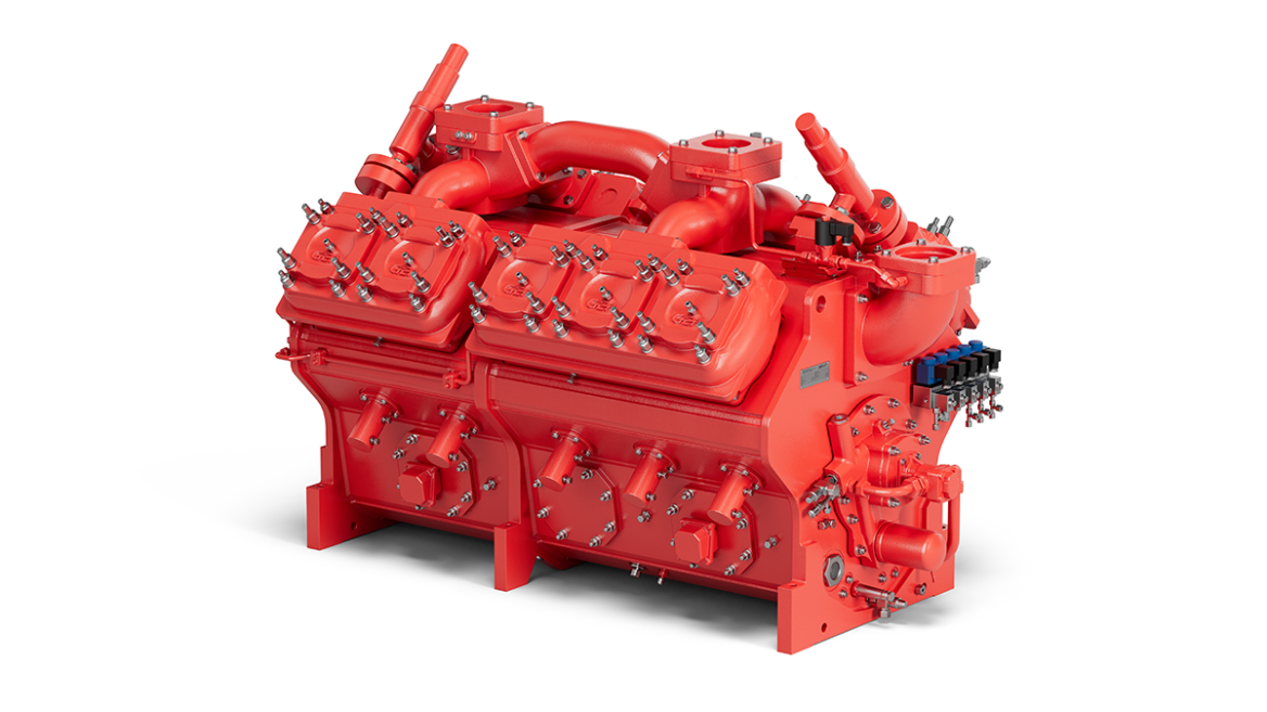 A large, red industrial machine with a complex structure is centrally featured. It appears to be a turbocharger or compressor machine with multiple tubes, bolts, and fasteners, commonly used in the automotive or aerospace industry.