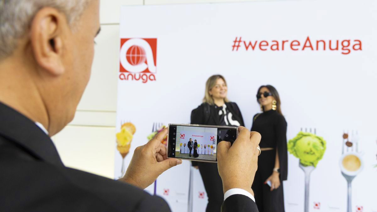 People are taking pictures at Anuga