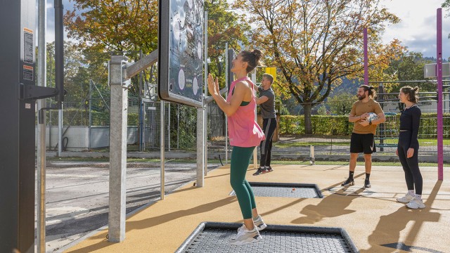 SportAtrium exercise park outdoor area with athletes SportAtrium exercise park outdoor area with athletes
