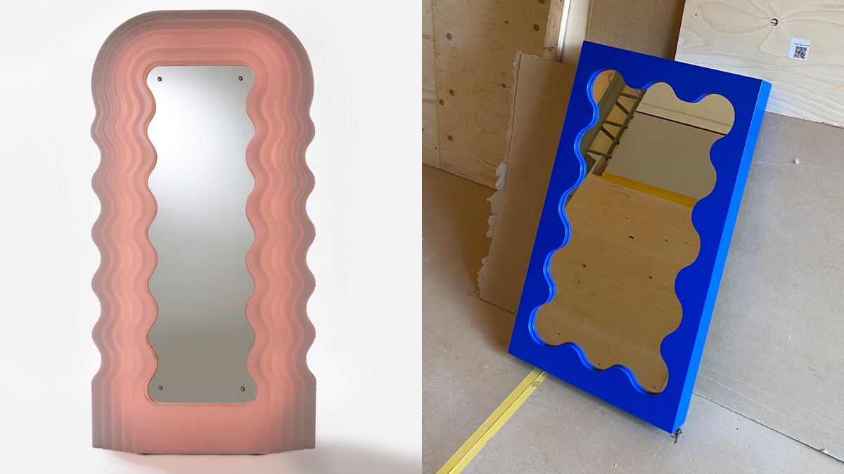 Kreative Einrichtung mit einer Lampe und einem Spiegel. Die Lampe besitzt eine große, glänzende ovale Glühbirne auf einem warmfarbenen Sockel. Der Spiegel hat eine unregelmäßige, wellenförmige Umrandung und zeigt eine moderne, künstlerische Gestaltung.