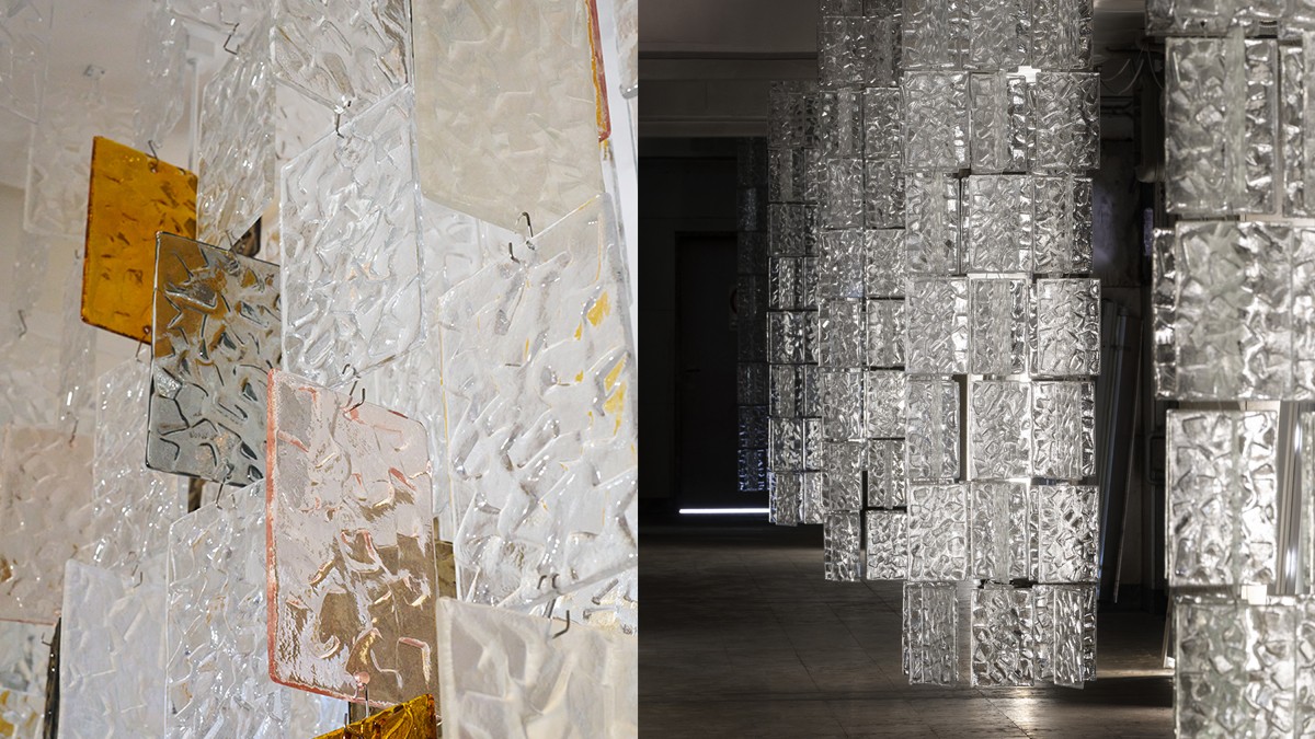 Large pendant lamps made of many textured glass panels with transparent and golden elements.