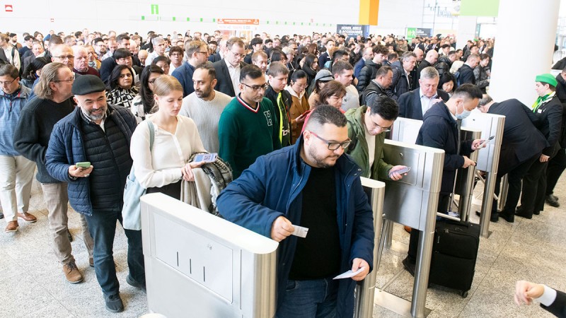 Crowd of visitors at the entrance to the EISENWARENMESSE - International Hardware Fair