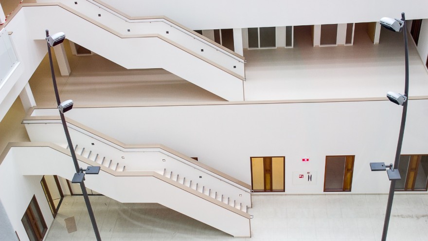Healing hospital architecture with staircase in soothing colours Healing hospital architecture with staircase in soothing colours