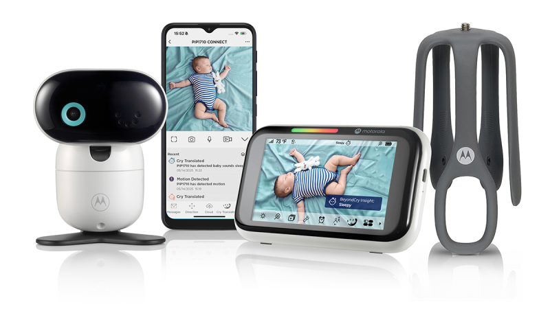 Motorola baby monitoring system with a camera, a smartphone app showing baby monitoring alerts, a video monitor displaying a baby, and a gray sensor device.