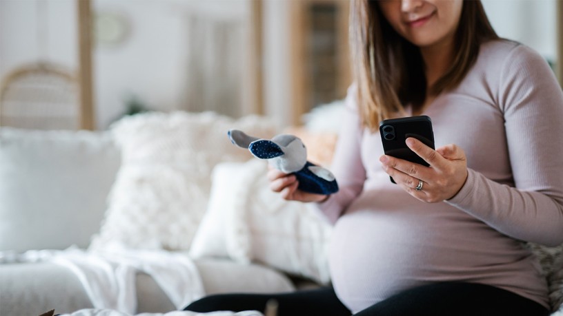 Millennial Parents: Pregnant woman buys baby products online