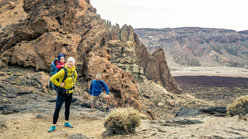 The unique target group parents: Family hikes with little boy in a backpack
