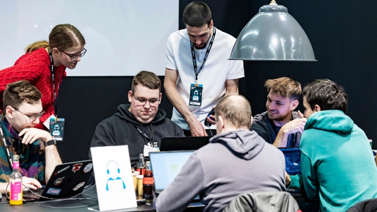 Participants in the hackathon at PMRExpo 2025